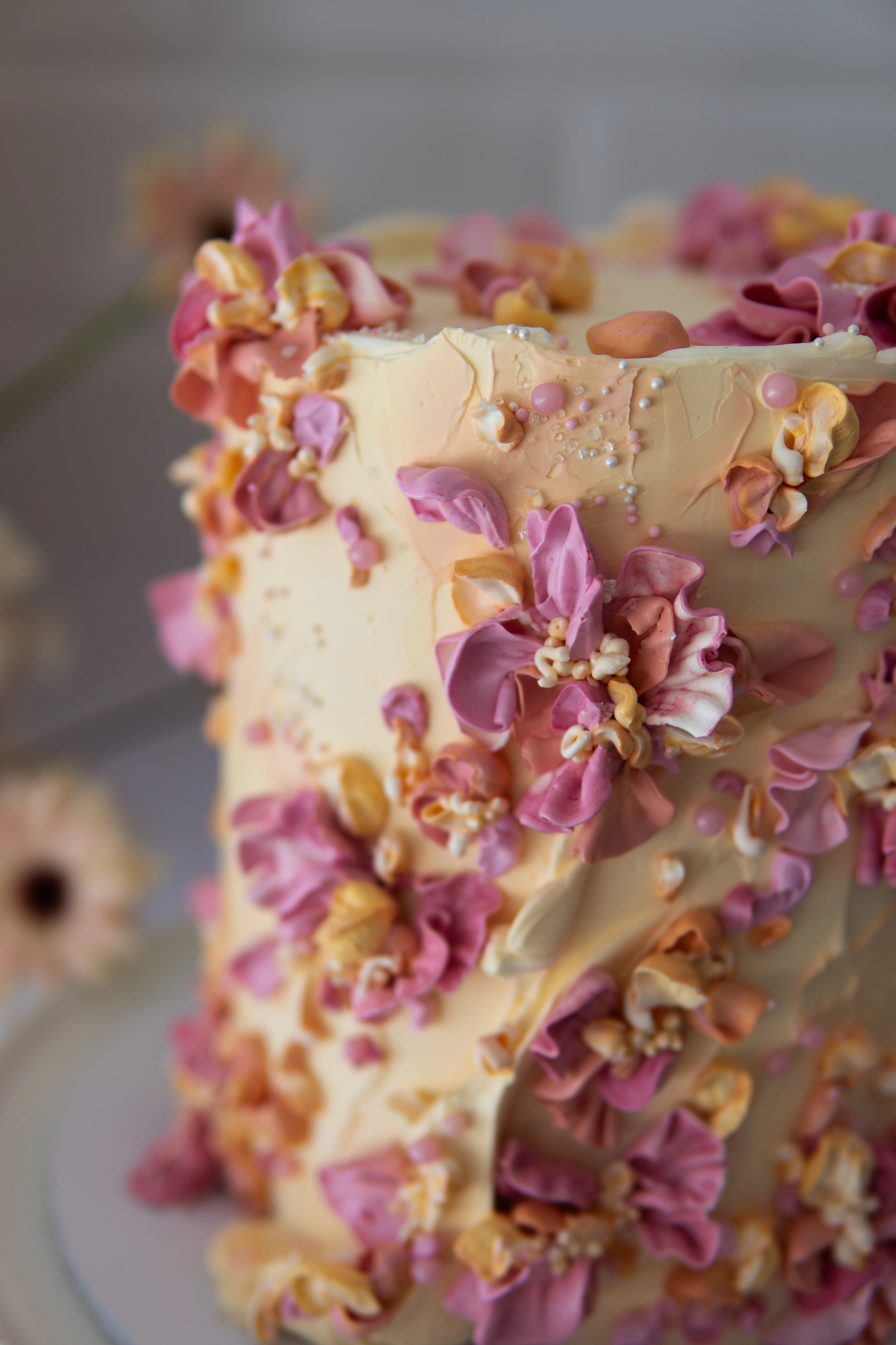 Elegant tiered cake with intricate decorations